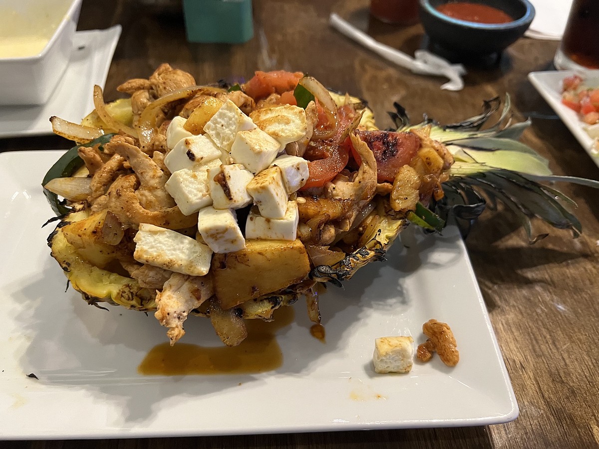Mucho Loco signature dishes Piña BurritoQuesabirriasCrazy Chicken